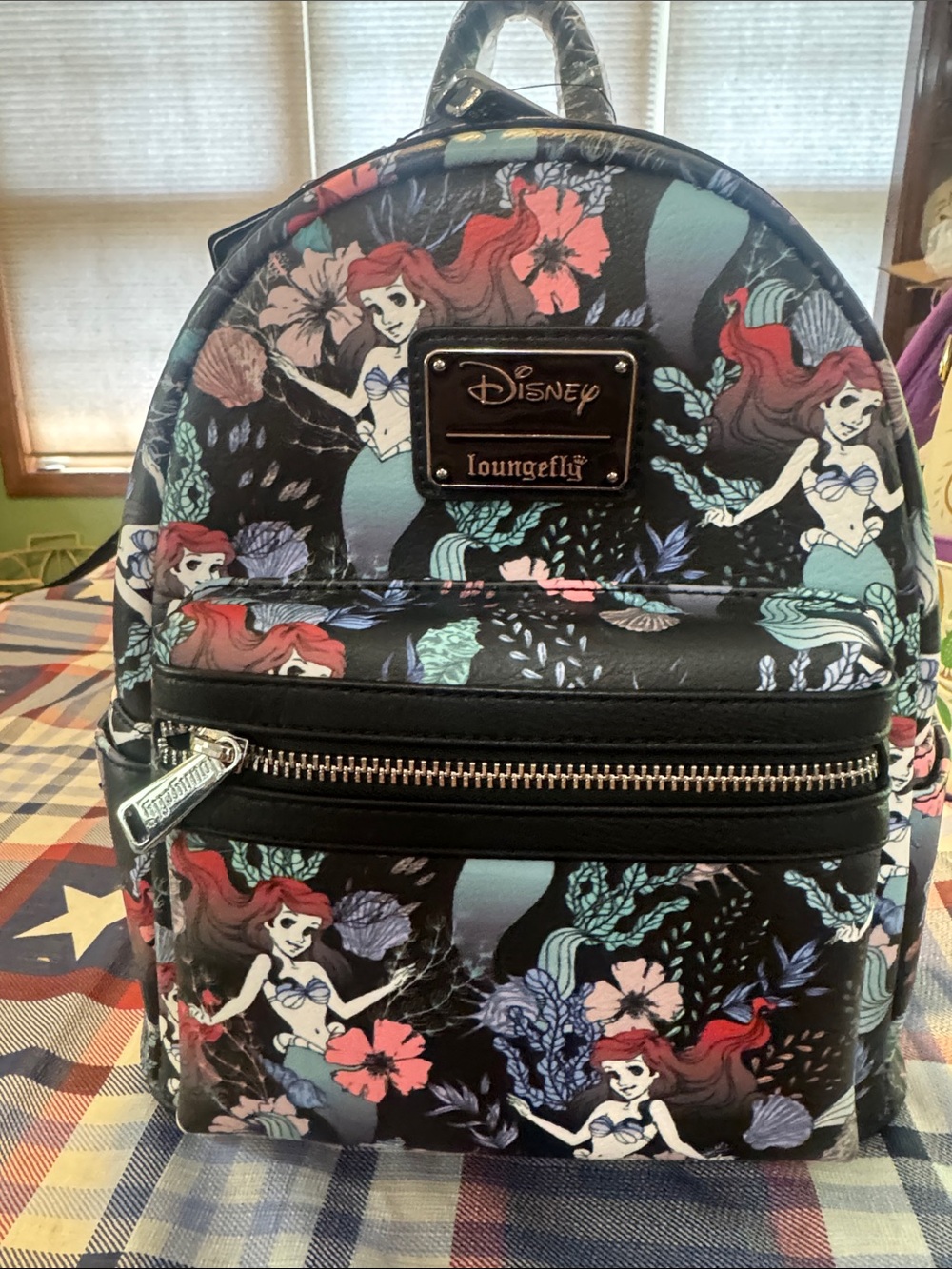 Loungefly Black Mini Backpack with Ariel Floral Print